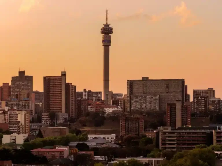 Johannesburg city centre skyline at sunset with its tall telecommunications tower
