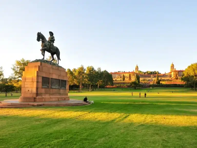Statue and lawns in front of the Union Buildings in Pretoria on a sunny day
